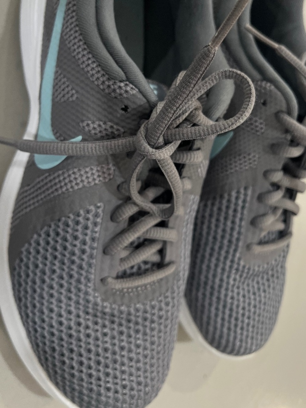 Gray/Blue Nike Sneakers.  7.5